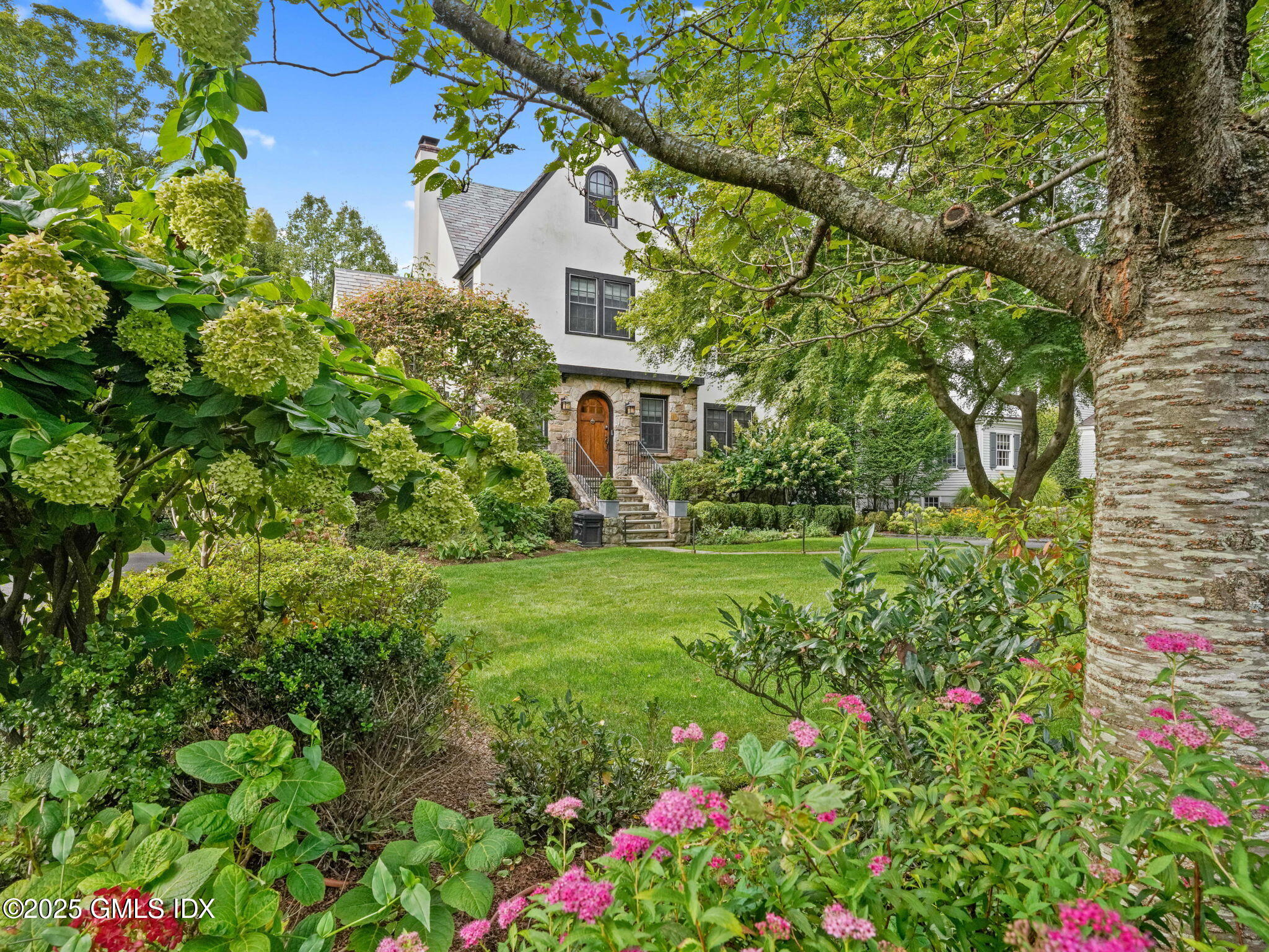 143 Lockwood Road Riverside, CT 06878 - Photo 34 of 39 a view of a house with a yard