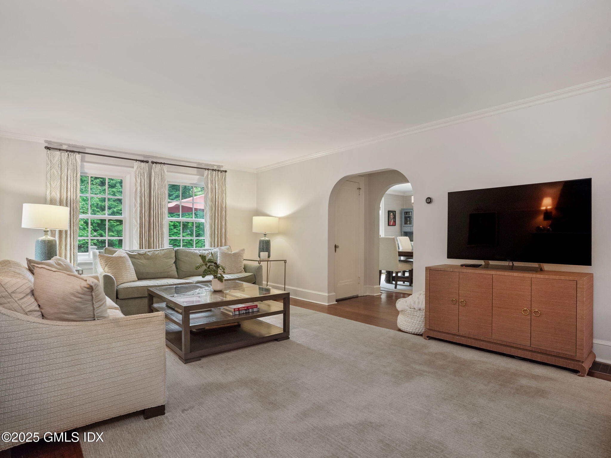 143 Lockwood Road Riverside, CT 06878 - Photo 5 of 39 a living room with furniture and a flat screen tv