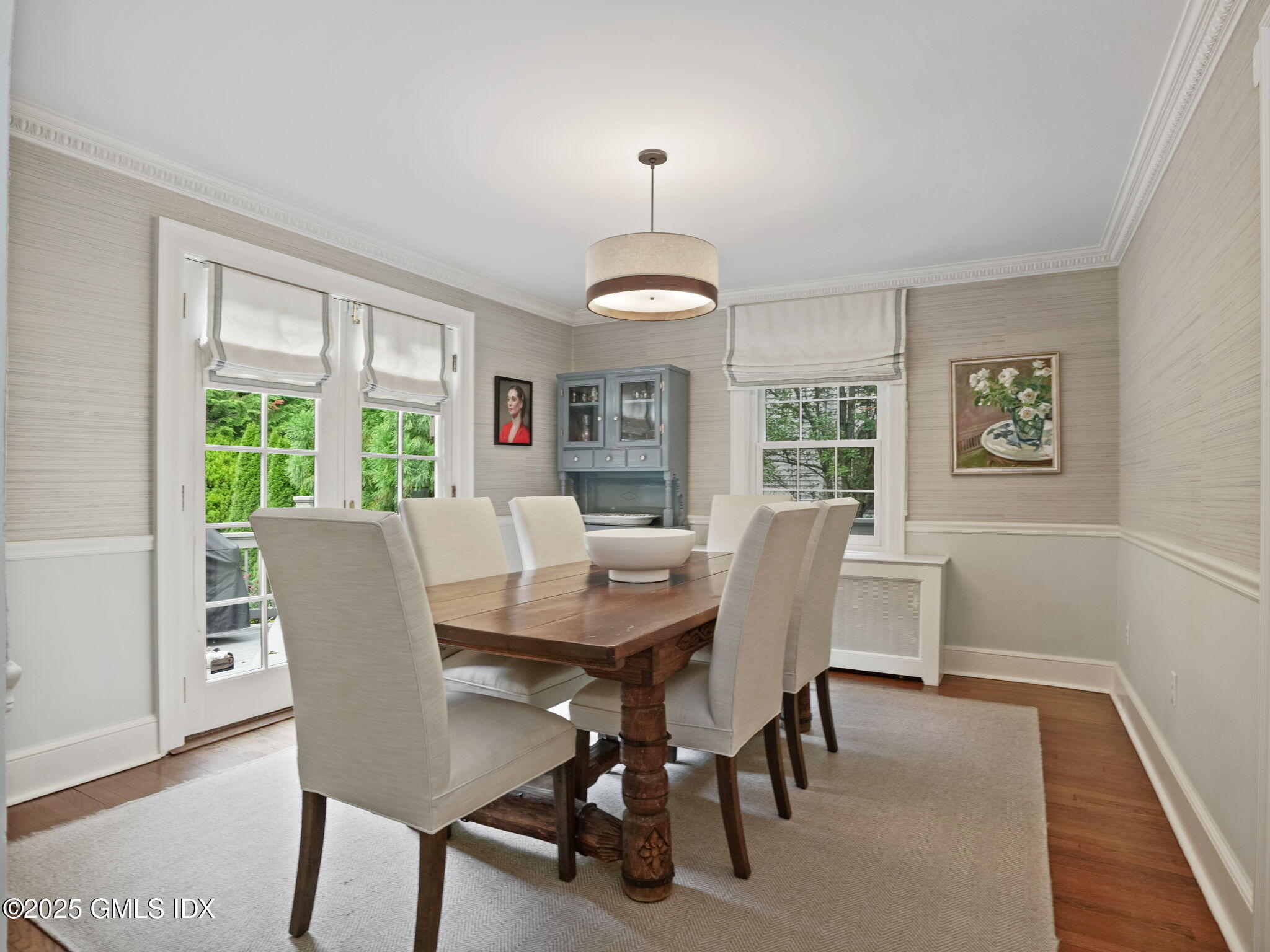 143 Lockwood Road Riverside, CT 06878 - Photo 7 of 39 a view of a dining room with furniture window and wooden floor