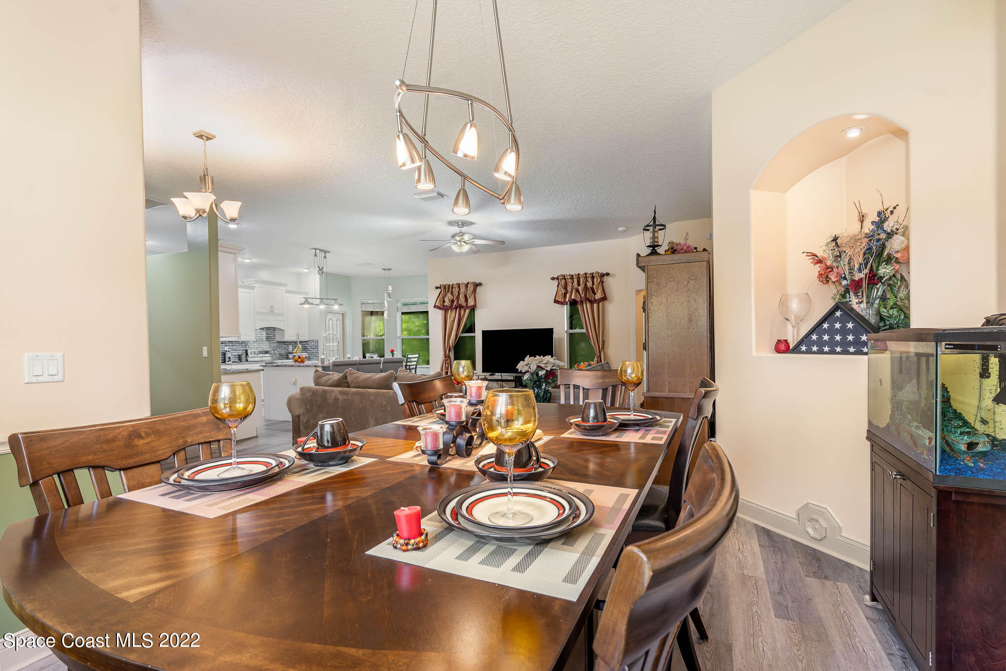 762 Seymour Road Northeast Palm Bay, FL 32905 - Photo 5 of 29 a view of a dining room with furniture