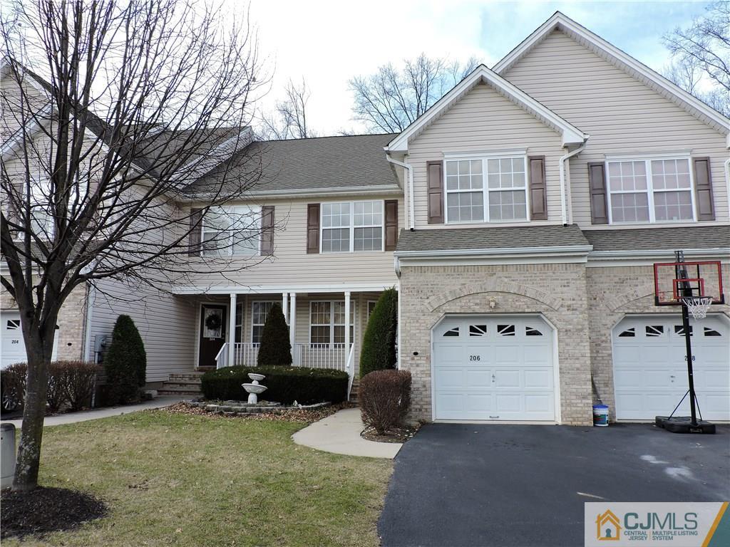 206 Hawthorne Road North Brunswick, NJ 08902 - Photo 1 of 24 a view of a yard in front of house