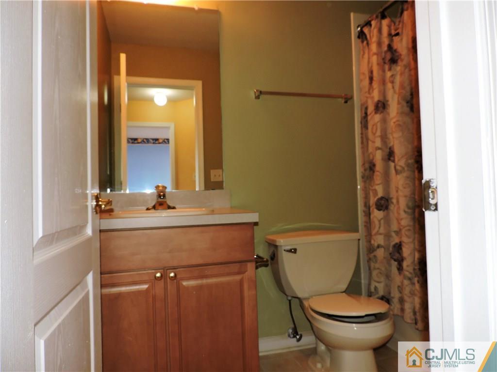 206 Hawthorne Road North Brunswick, NJ 08902 - Photo 17 of 24 a bathroom with a sink toilet and shower