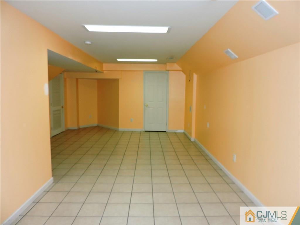 206 Hawthorne Road North Brunswick, NJ 08902 - Photo 19 of 24 a view of a room with white walls