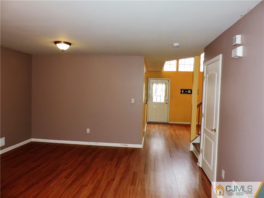206 Hawthorne Road North Brunswick, NJ 08902 - Photo 3 of 24 a view of hallway with wooden floor