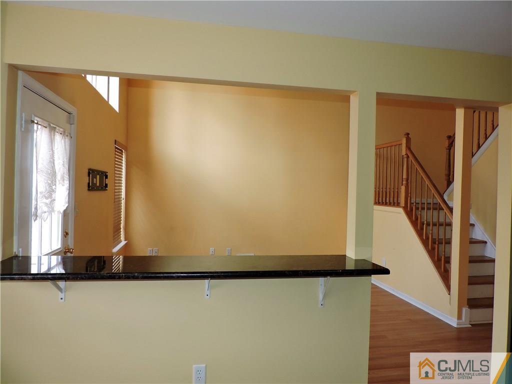 206 Hawthorne Road North Brunswick, NJ 08902 - Photo 10 of 24 a view of a room with wooden floor