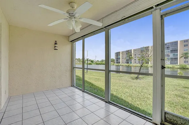 a view of a building with a yard