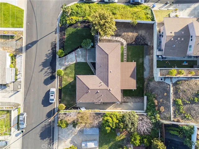an aerial view of houses with outdoor space