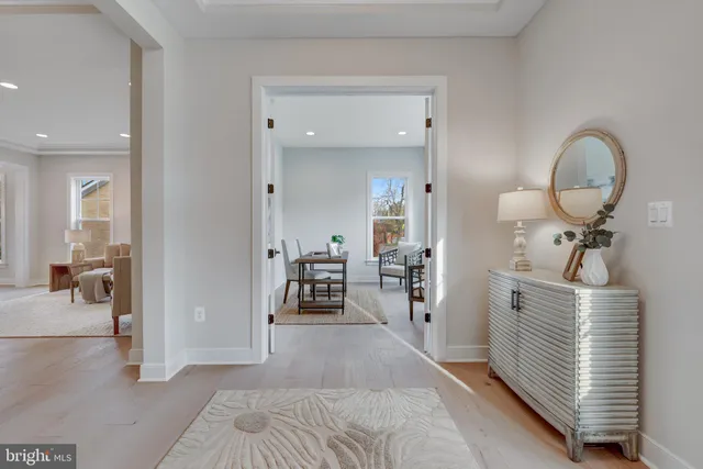 a living room with furniture and a lamp
