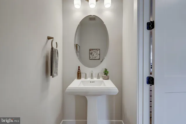 a living room with fireplace furniture and a flat screen tv