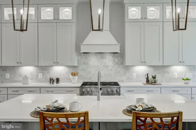 a bathroom with a shower sink double and mirror
