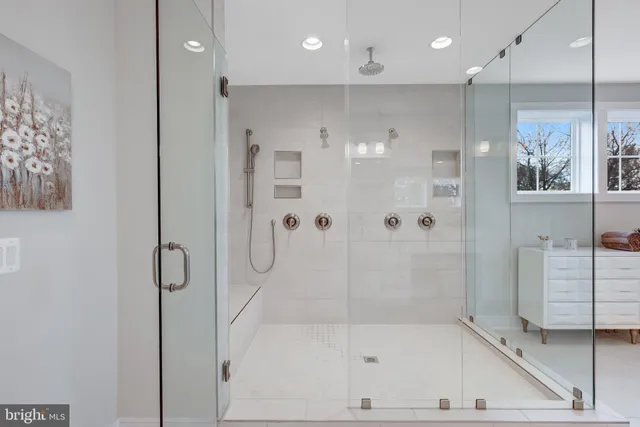 a living room with furniture a rug and a window