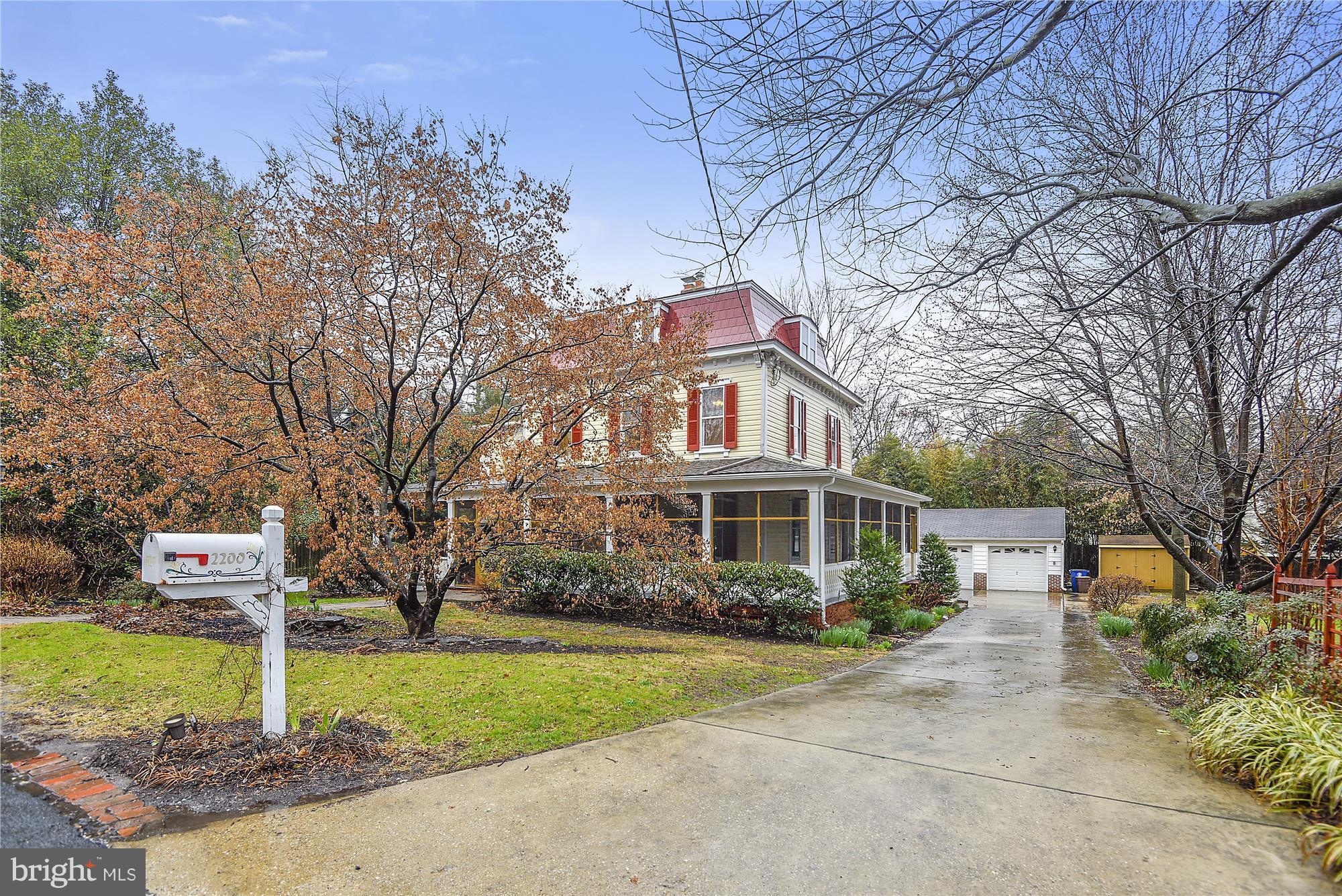 2200 Salisbury Road Silver Spring, MD 20910 - Photo 2 of 26 a front view of a house with a yard and trees