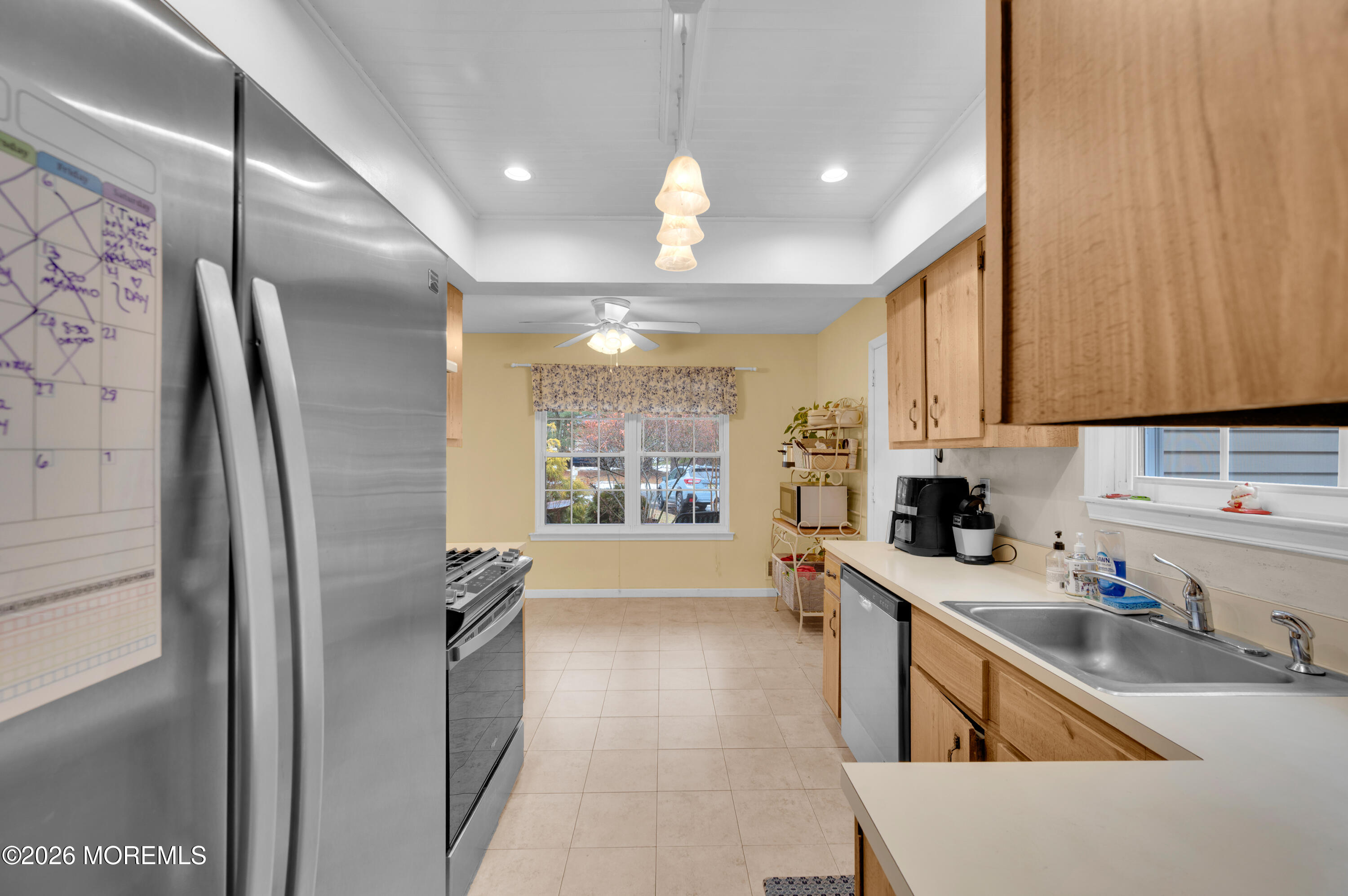 7 Deck Court Howell, NJ 07731 - Photo 1 of 29 a kitchen that has a sink a refrigerator and window