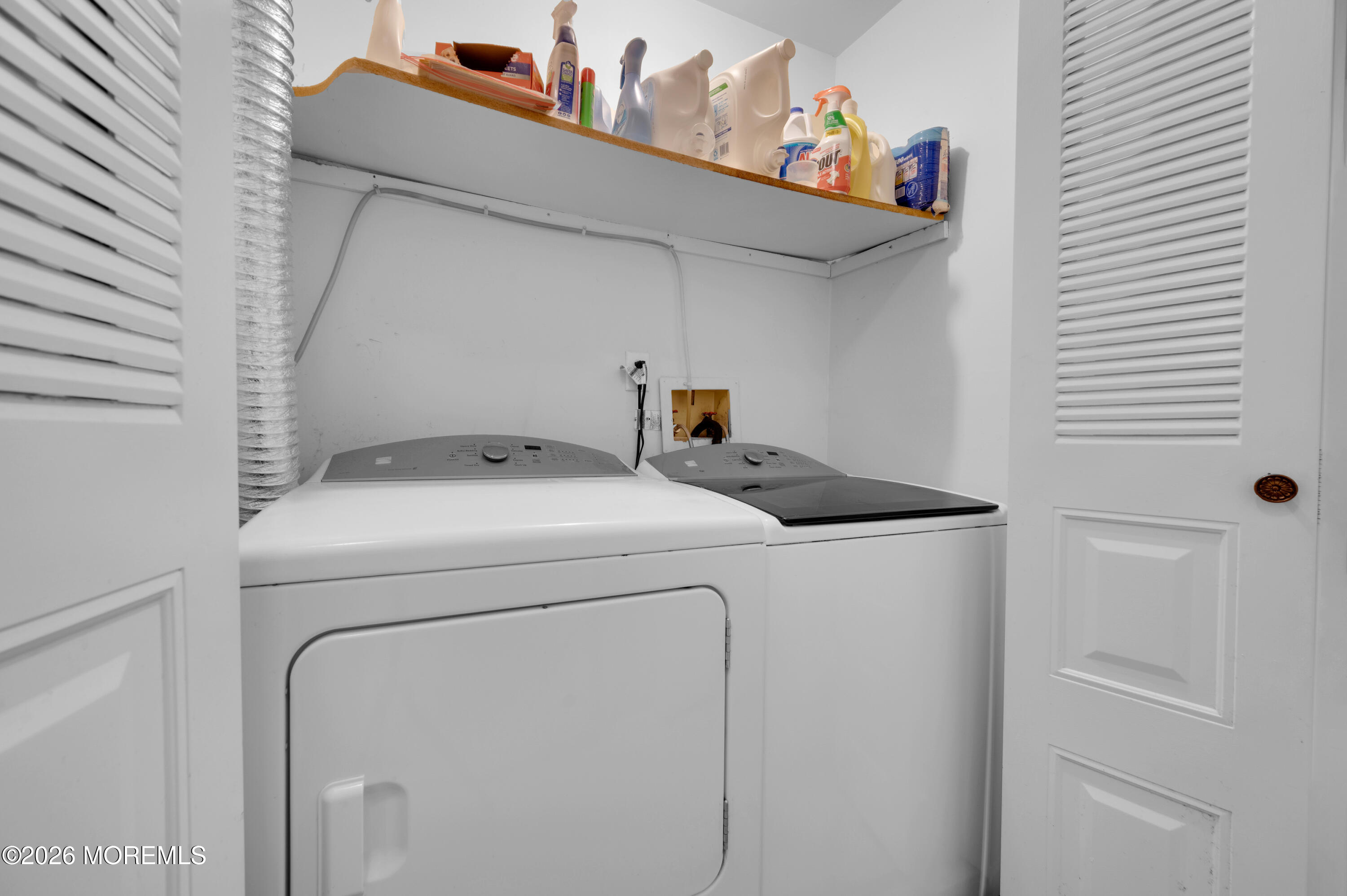 7 Deck Court Howell, NJ 07731 - Photo 11 of 29 a utility room with dryer and washer
