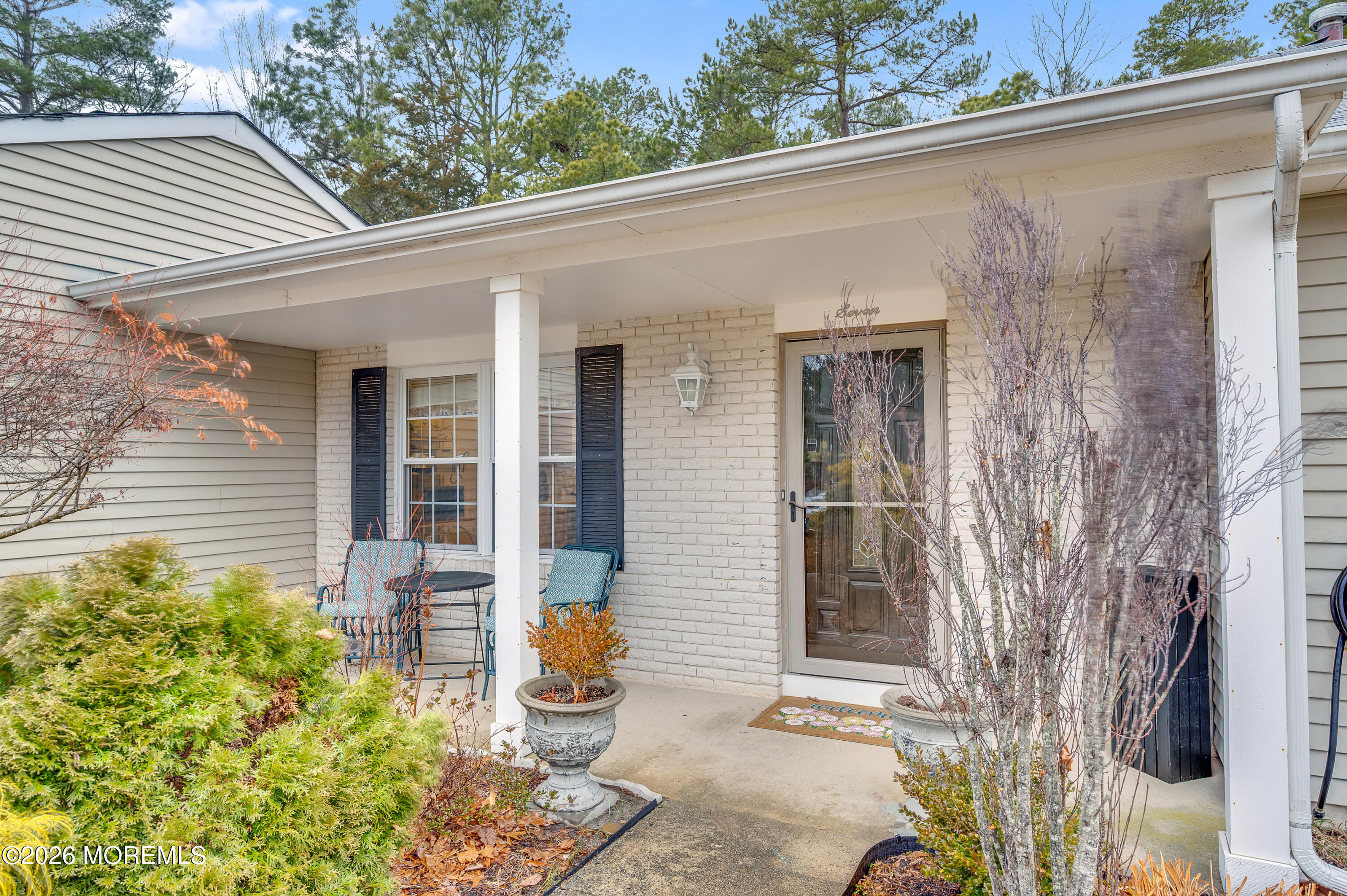 7 Deck Court Howell, NJ 07731 - Photo 13 of 29 a front view of a house with garden