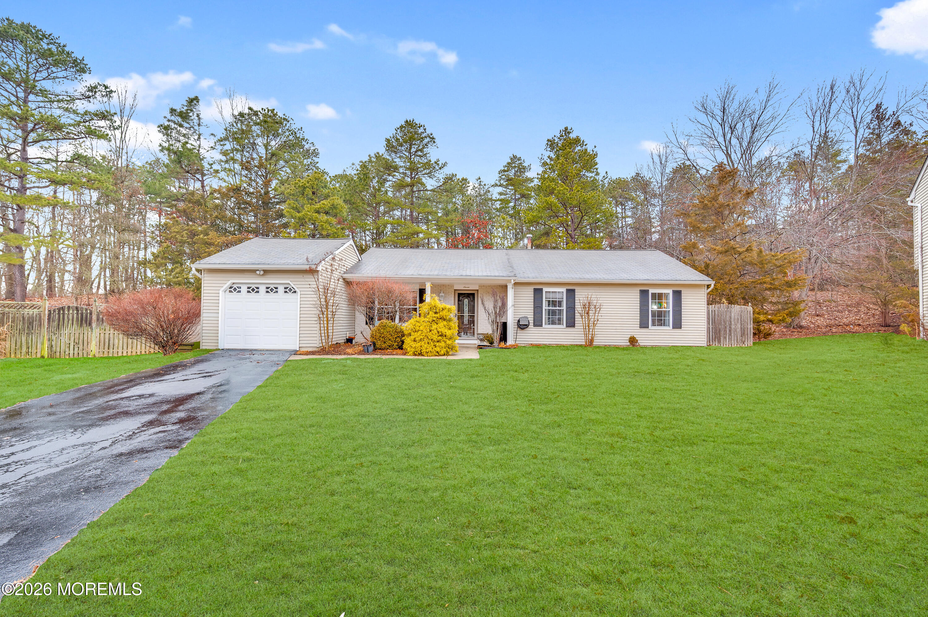 7 Deck Court Howell, NJ 07731 - Photo 14 of 29 a front view of a house with garden