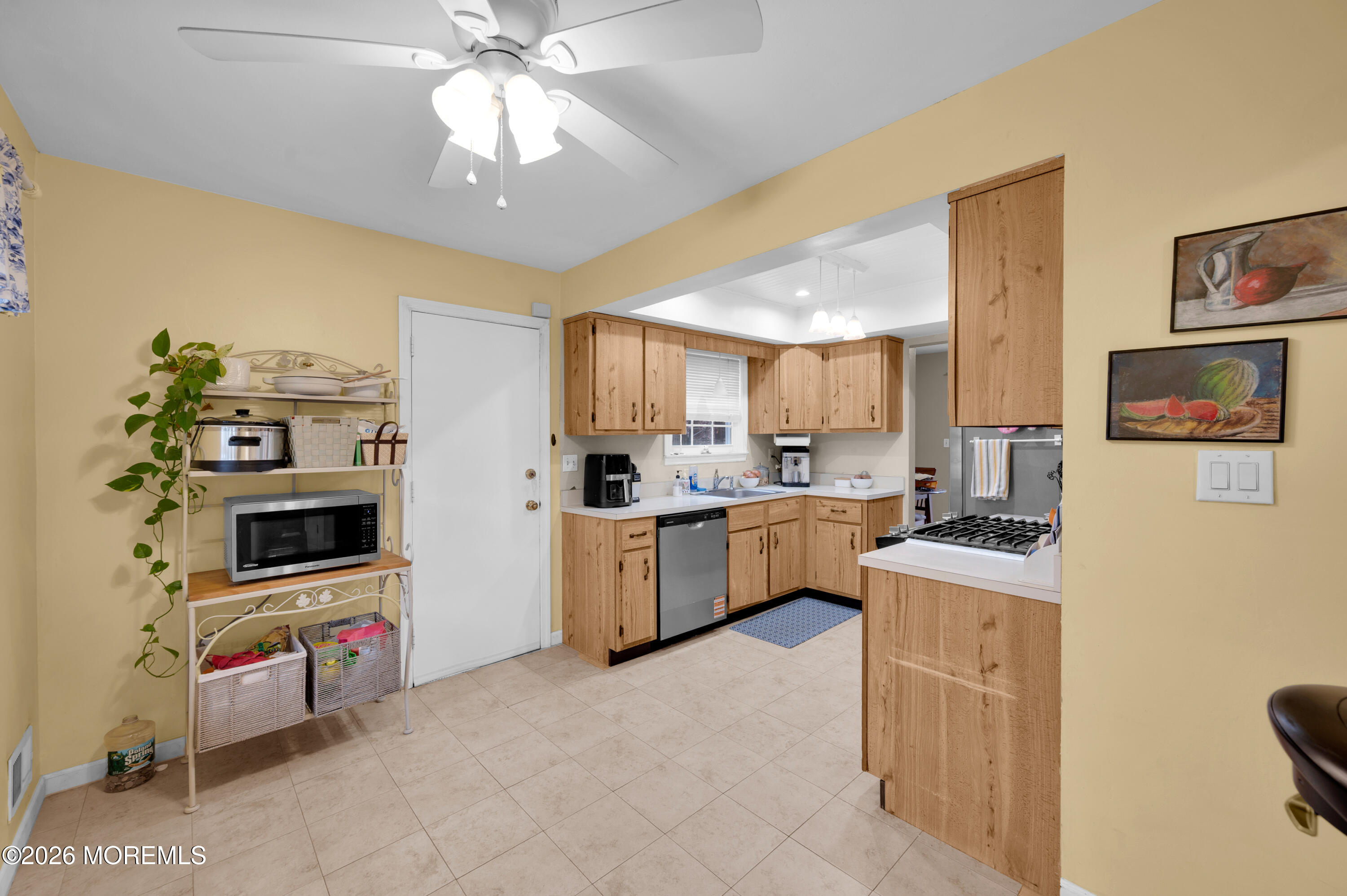 7 Deck Court Howell, NJ 07731 - Photo 18 of 29 a kitchen that has a lot of cabinets a sink and appliances