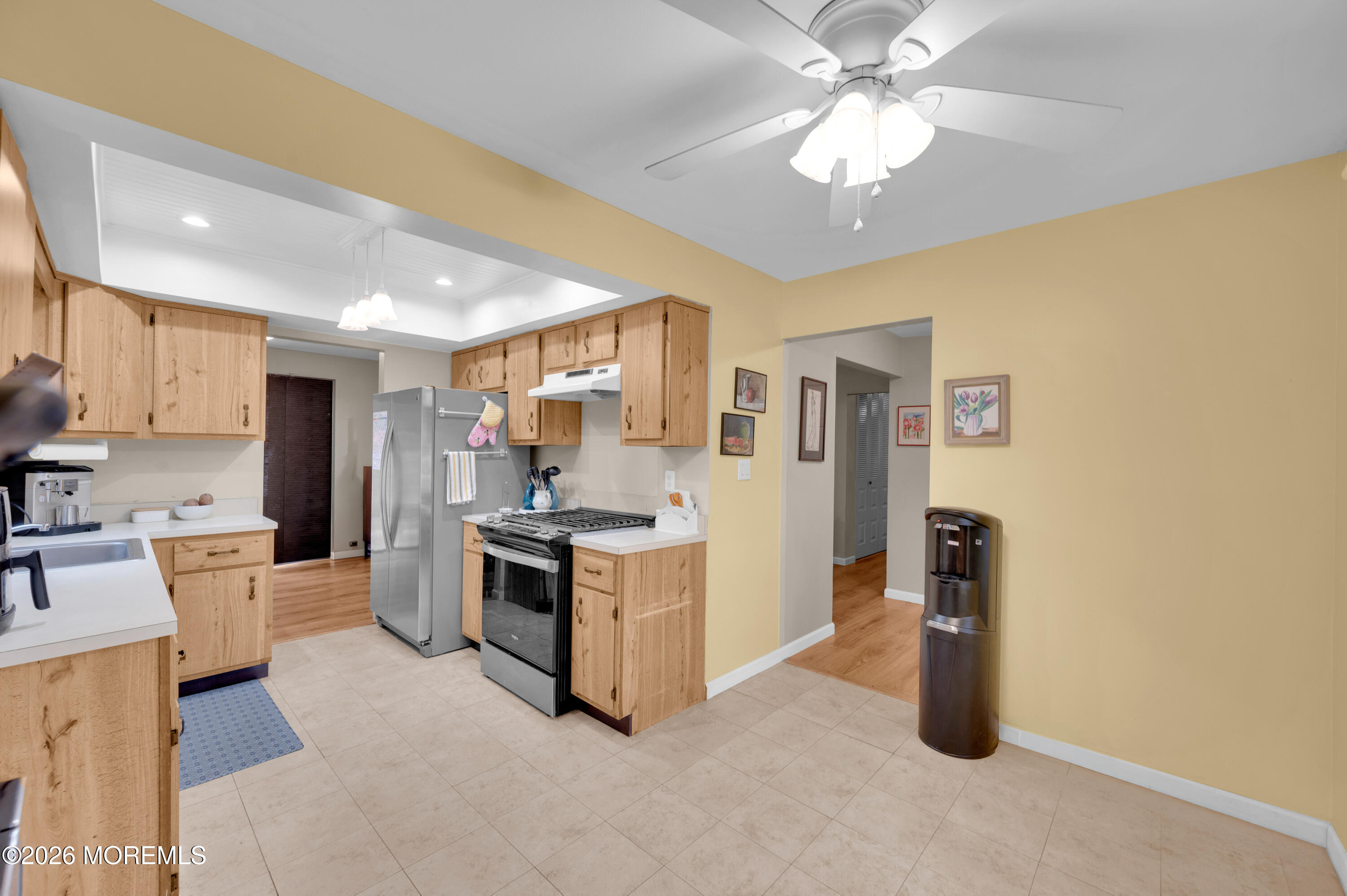 7 Deck Court Howell, NJ 07731 - Photo 19 of 29 a kitchen with cabinets and stainless steel appliances