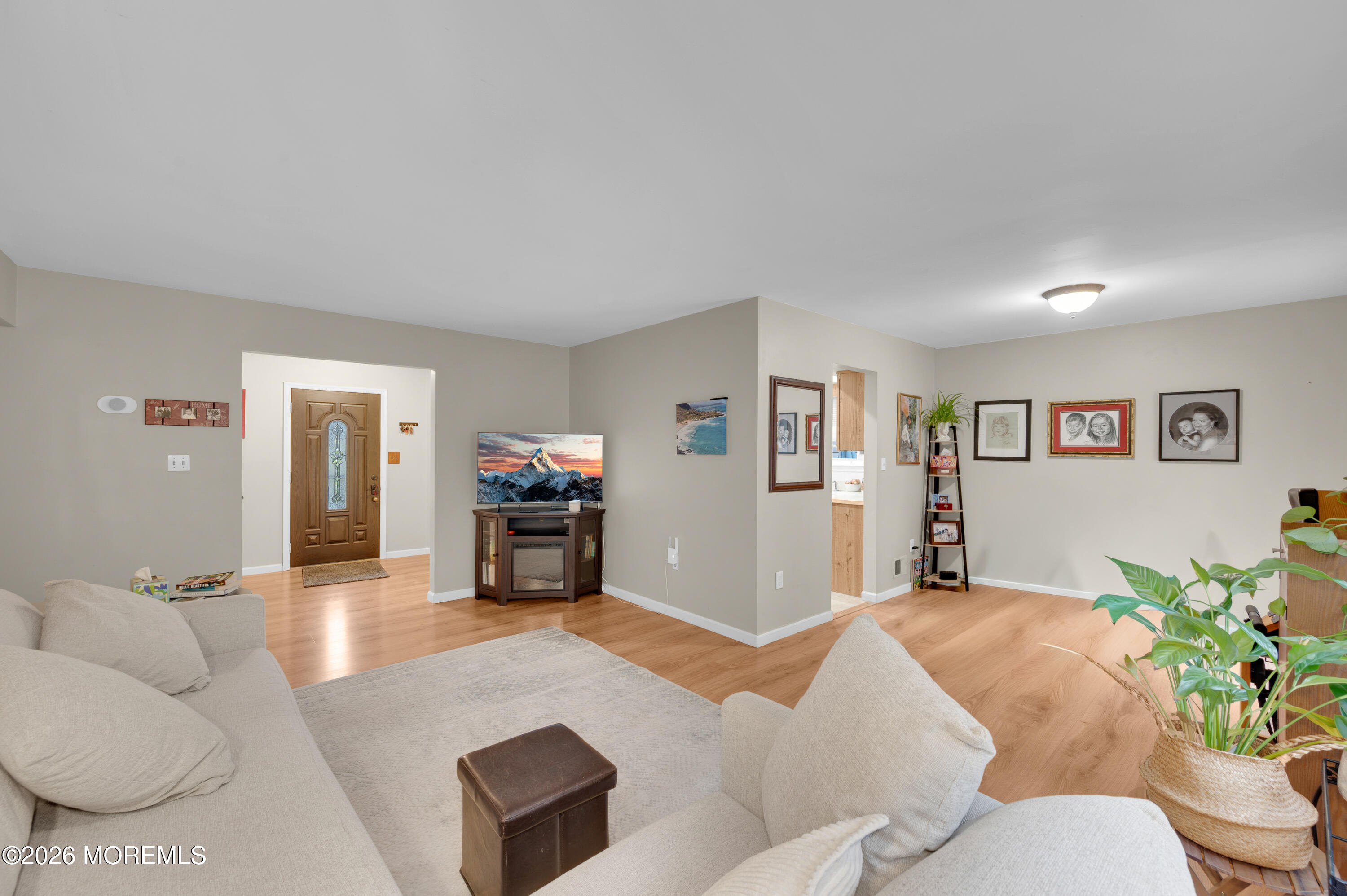 7 Deck Court Howell, NJ 07731 - Photo 2 of 29 a living room with furniture and wooden floor