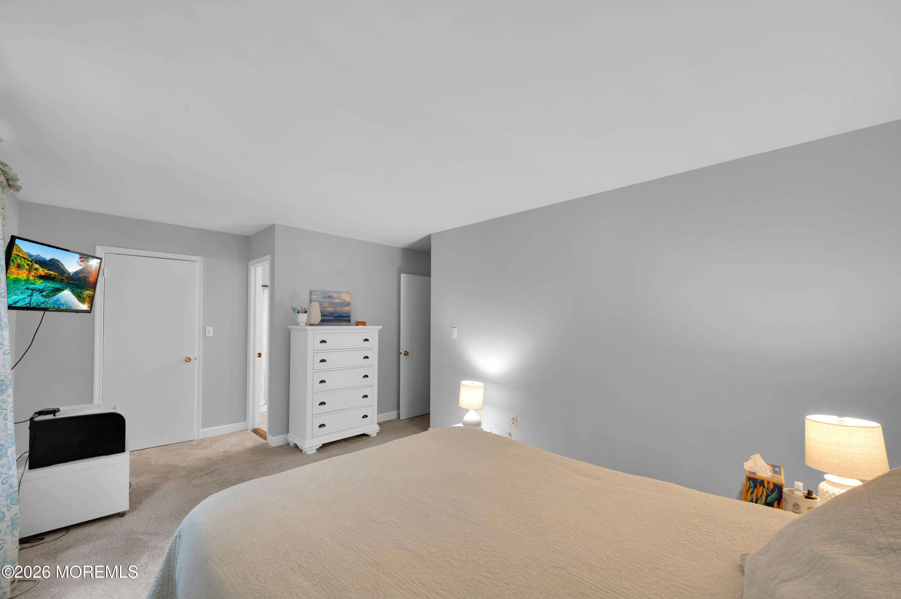 7 Deck Court Howell, NJ 07731 - Photo 21 of 29 a bedroom with a bed and a cabinets