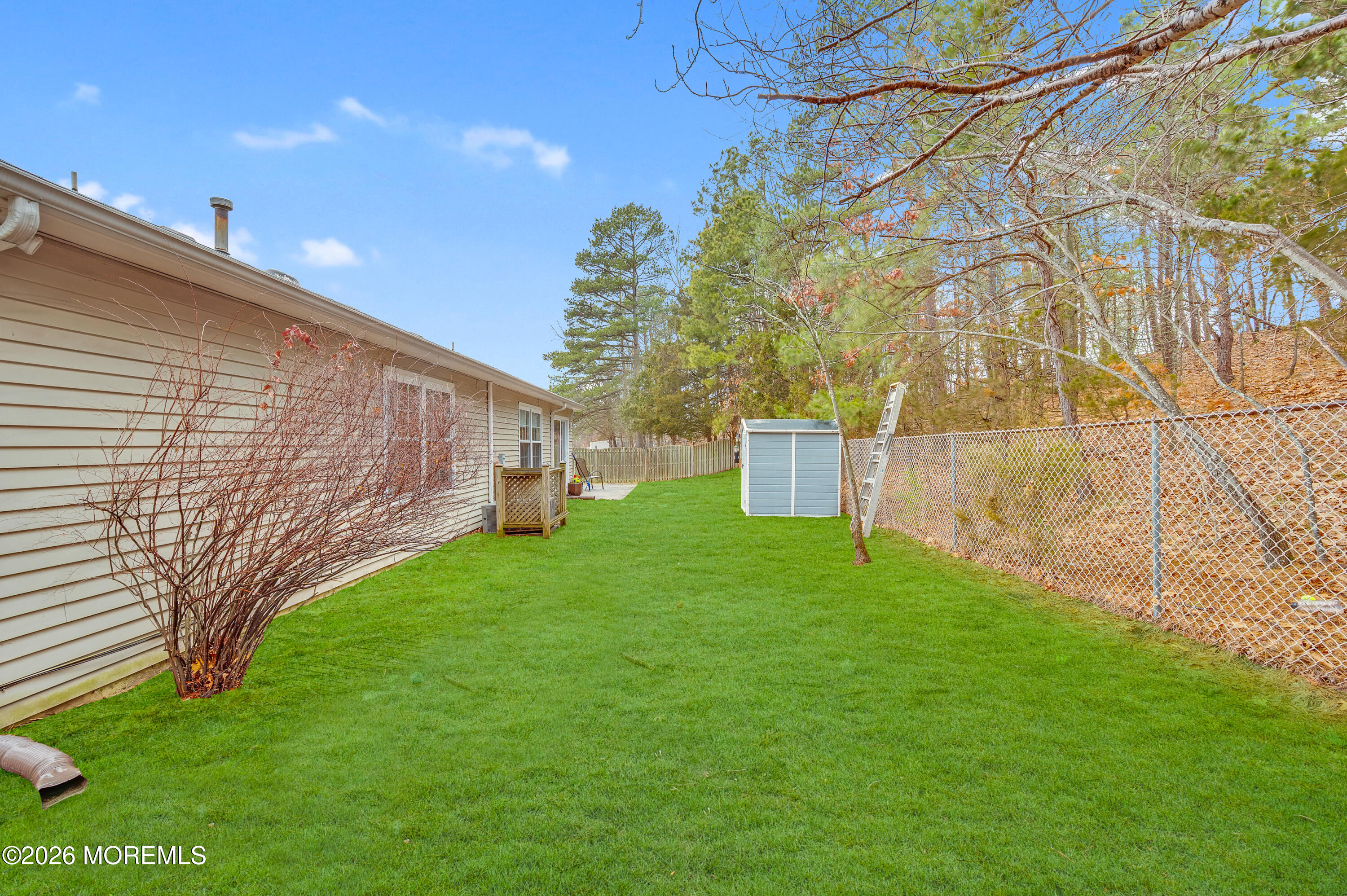7 Deck Court Howell, NJ 07731 - Photo 25 of 29 a view of a back yard of the house
