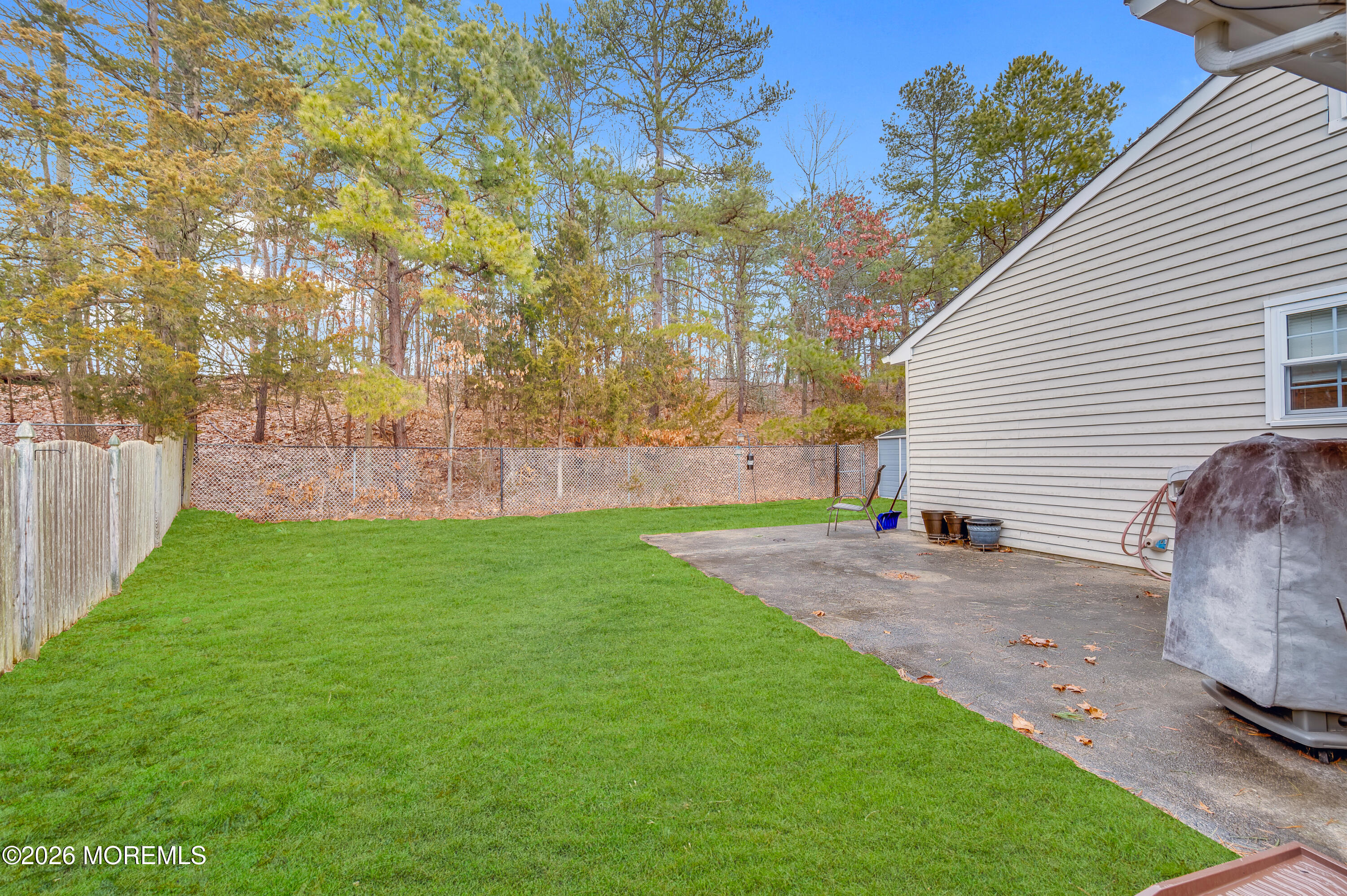 7 Deck Court Howell, NJ 07731 - Photo 26 of 29 a view of backyard with green space