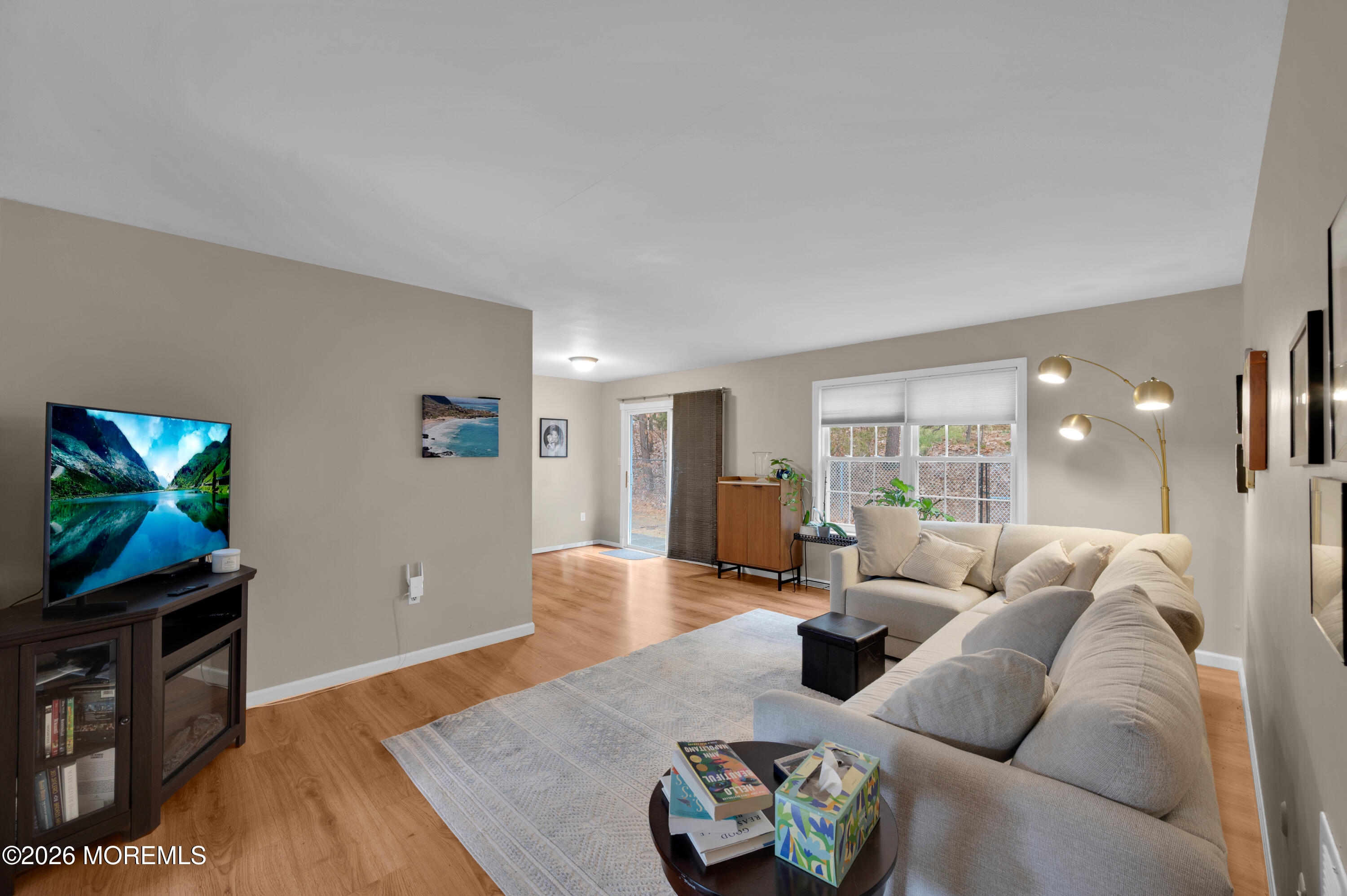 7 Deck Court Howell, NJ 07731 - Photo 5 of 29 a living room with furniture and a flat screen tv