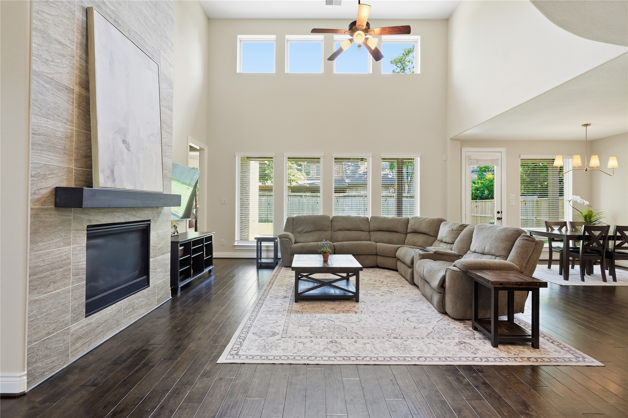 6429 Remlap Street Houston, TX 77055 - Photo 9 of 30 Spacious formal living area with soaring ceilings, abundant natural light, and a sleek fireplace.