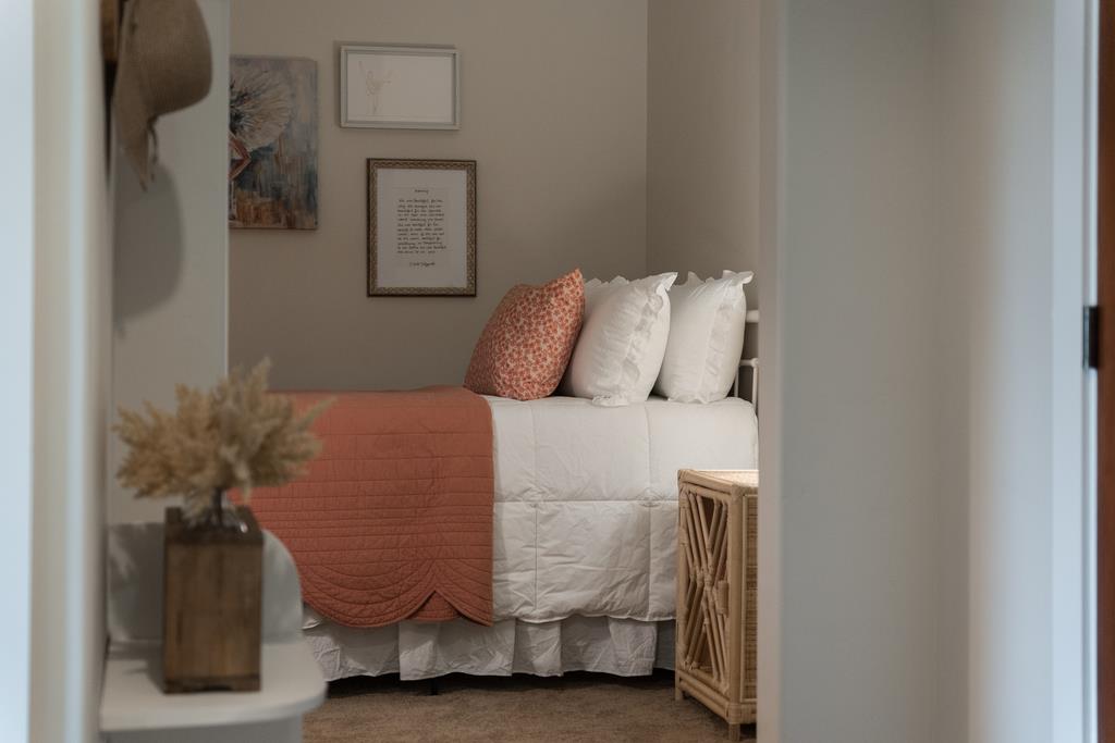 708 Frederick Street, Unit 204 Santa Cruz, CA 95062 - Photo 20 of 34 a large bed sitting in a bedroom next to a window