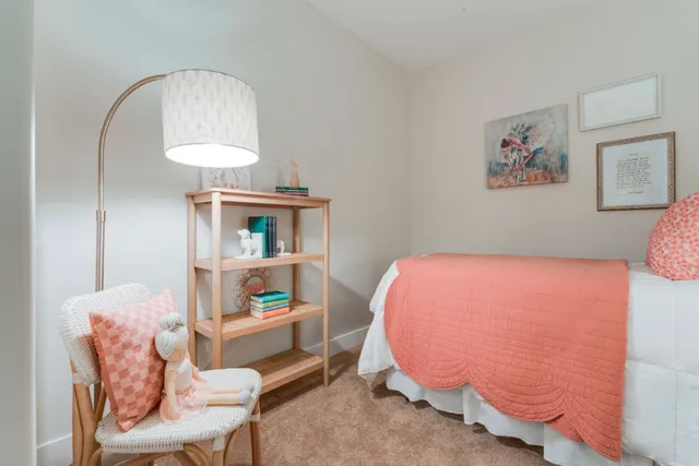 a view of a hallway with front door