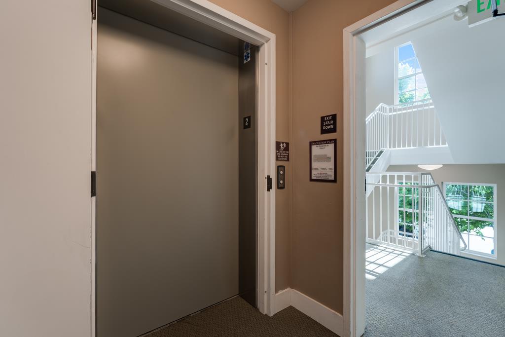 708 Frederick Street, Unit 204 Santa Cruz, CA 95062 - Photo 23 of 34 a view of a hallway with front door