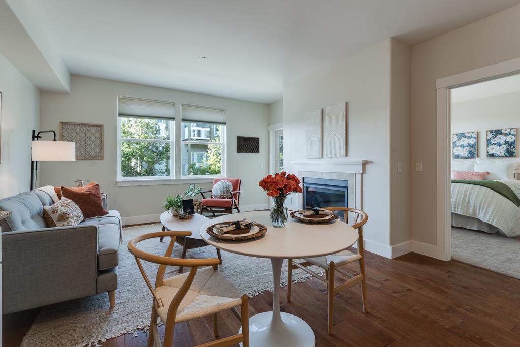 708 Frederick Street, Unit 204 Santa Cruz, CA 95062 - Photo 7 of 34 a view of a dining room with furniture window and wooden floor