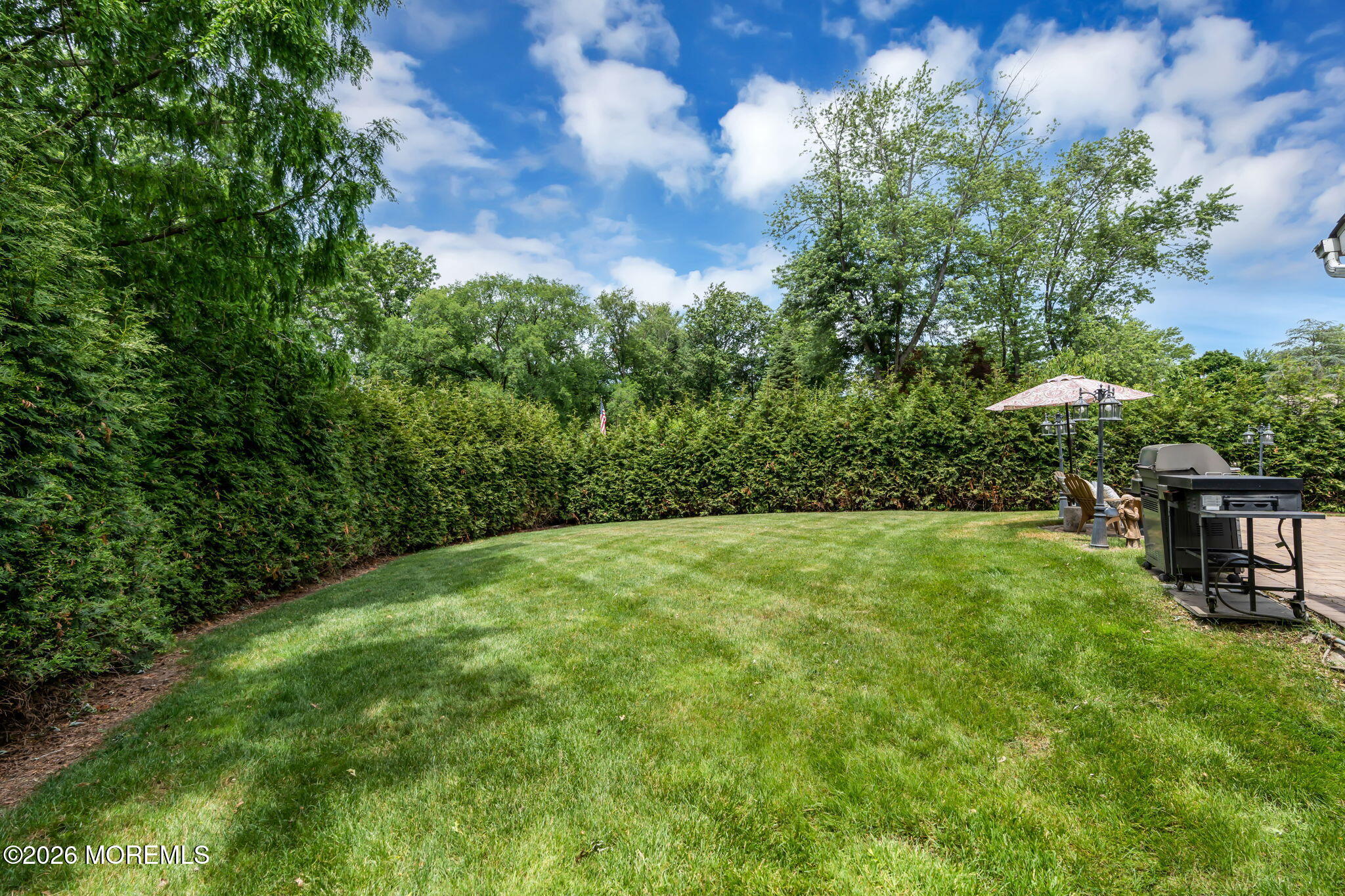 8 Owens Road Marlboro, NJ 07746 - Photo 37 of 39 a view of an outdoor space and a yard