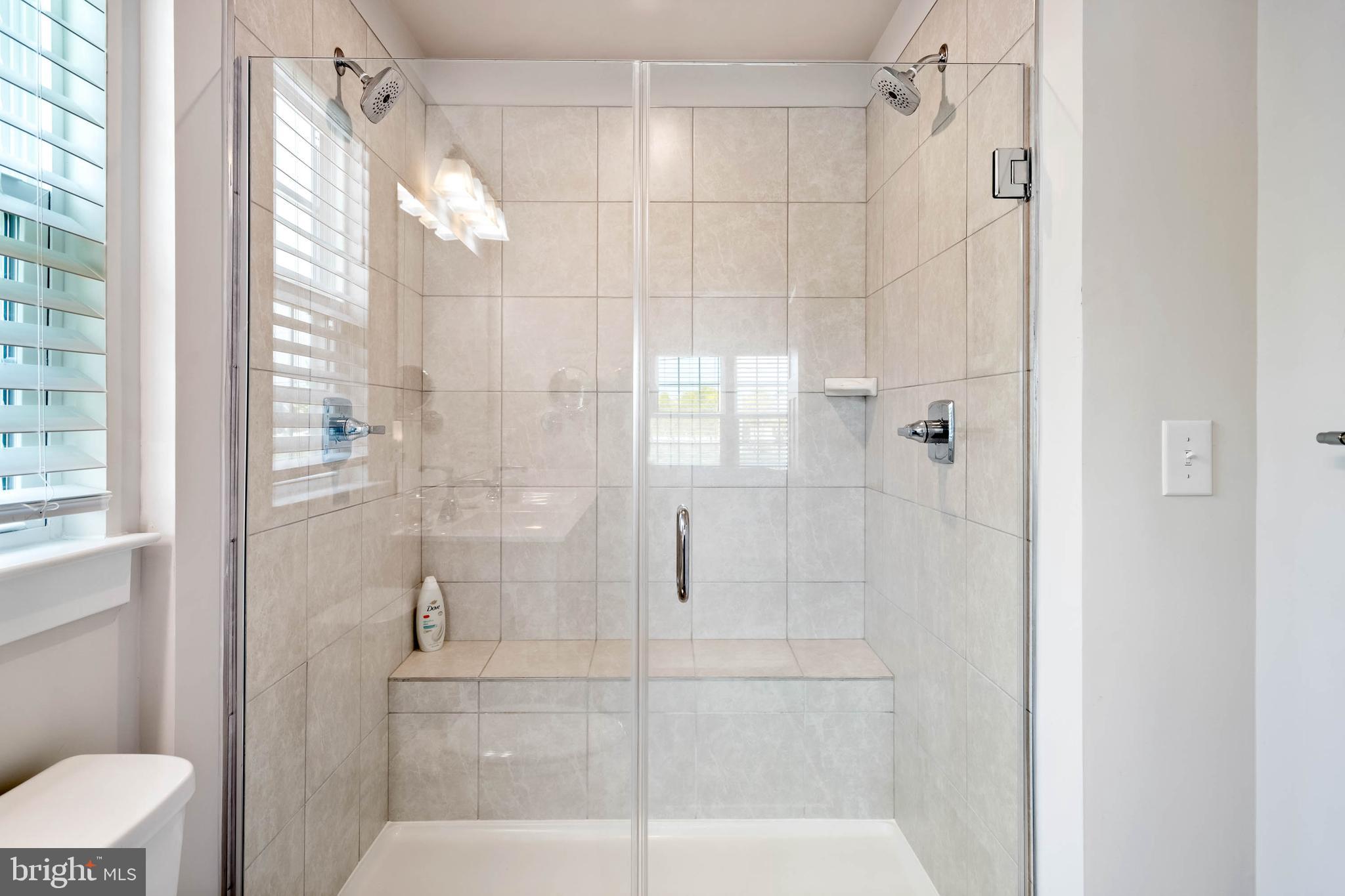 19016 Trimaran Drive Lewes, DE 19958 - Photo 22 of 44 a bathroom with a shower and toilet