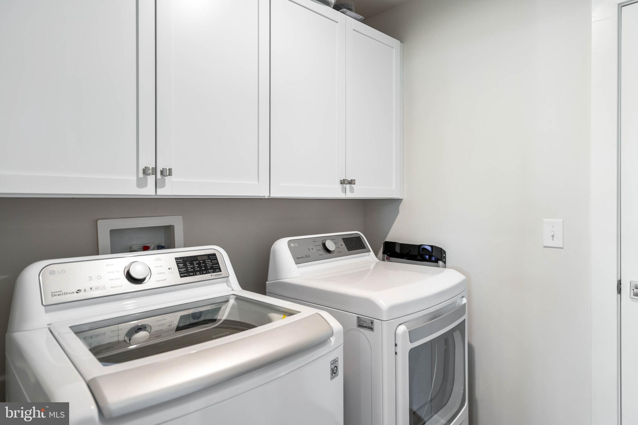 19016 Trimaran Drive Lewes, DE 19958 - Photo 30 of 44 a utility room with dryer and washer