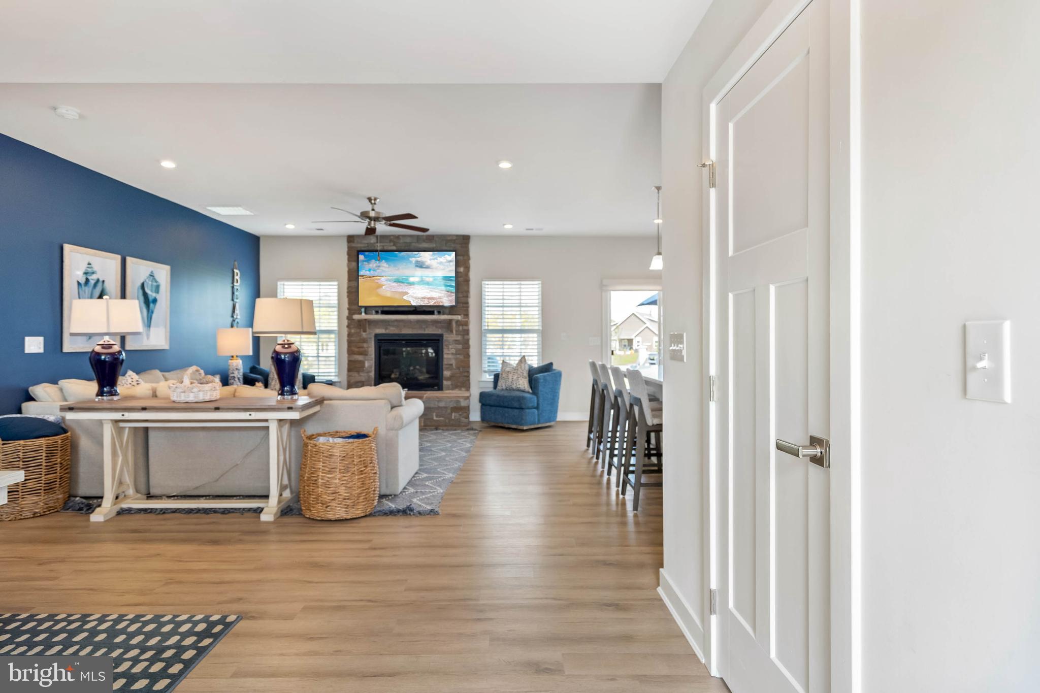 19016 Trimaran Drive Lewes, DE 19958 - Photo 4 of 44 a living room with furniture and a fireplace