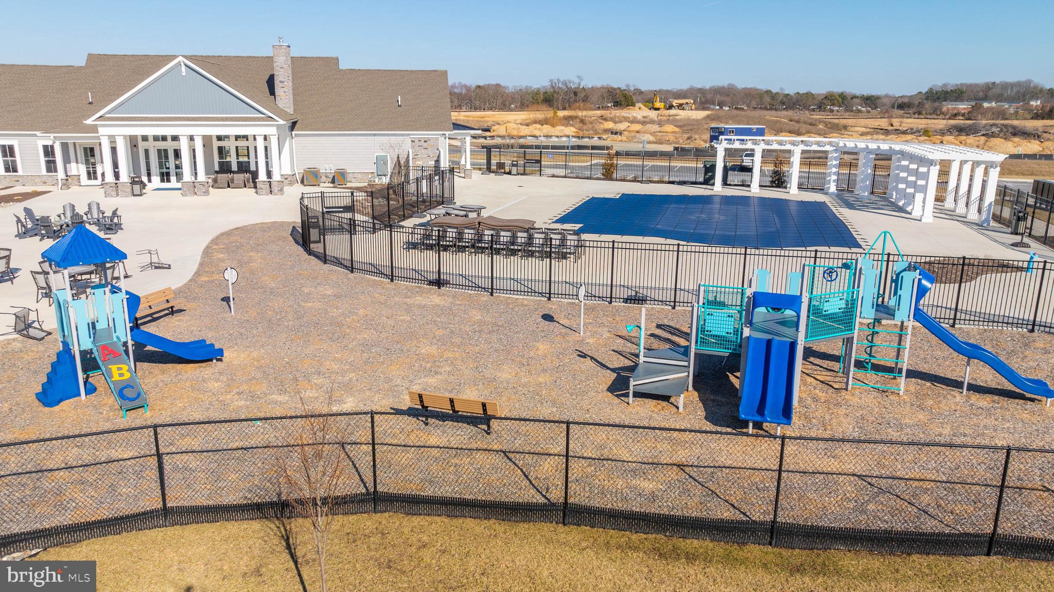 19016 Trimaran Drive Lewes, DE 19958 - Photo 44 of 44 a view of a swimming pool with a lounge chair
