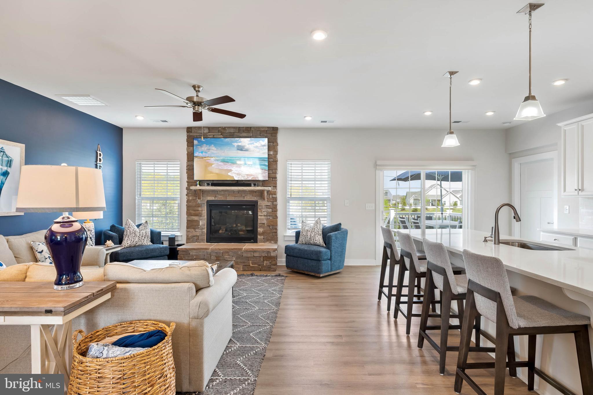 19016 Trimaran Drive Lewes, DE 19958 - Photo 6 of 44 a view of a a dining room with furniture window and wooden floor