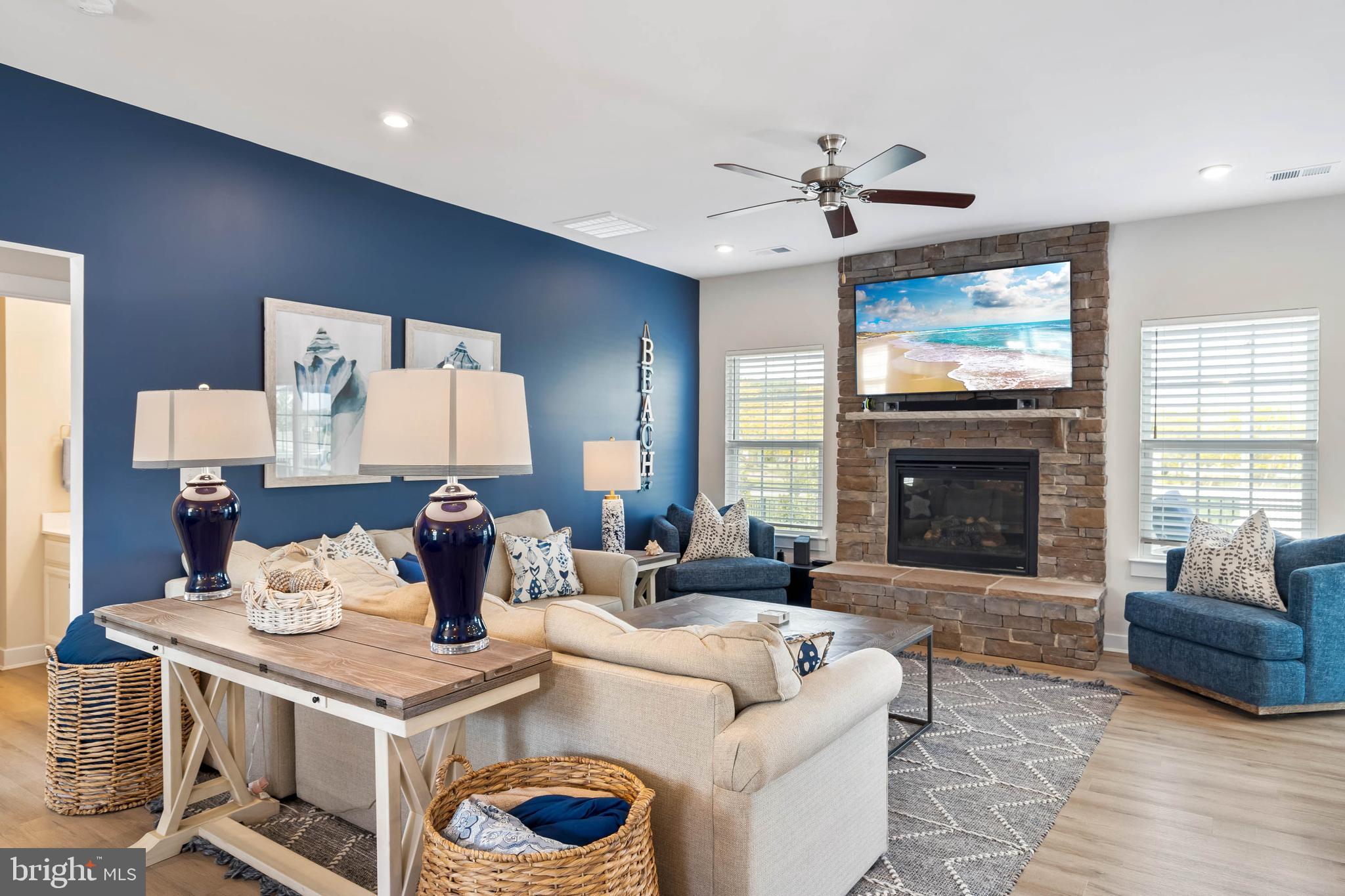 19016 Trimaran Drive Lewes, DE 19958 - Photo 7 of 44 a living room with furniture and a fireplace