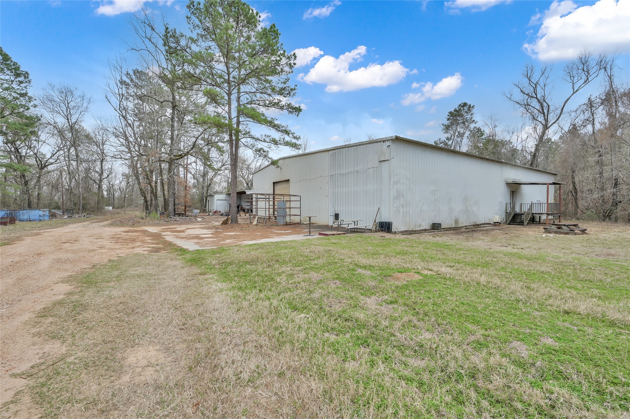 480 Bowling Road Point Blank, TX 77364 - Photo 5 of 23 a view of a house with backyard and tree