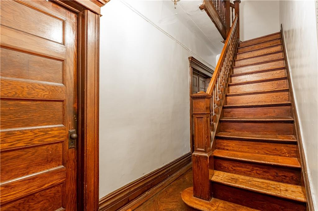 505 Macon Street Brooklyn, NY 11233 - Photo 4 of 6 a view of entryway with wooden floor