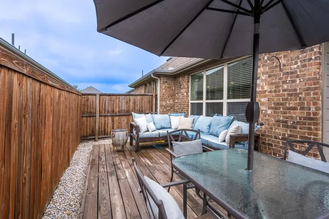 a front view of a house with patio