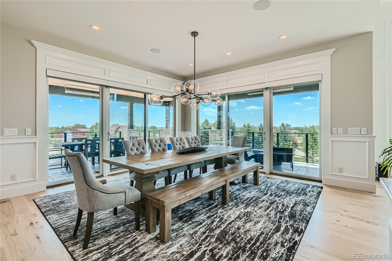 1757 Whistlepig Lane Broomfield, CO 80020 - Photo 23 of 50 a outdoor space with furniture and large windows