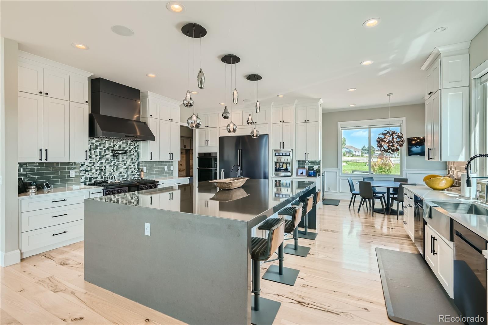 1757 Whistlepig Lane Broomfield, CO 80020 - Photo 25 of 50 a view of a dining area with furniture