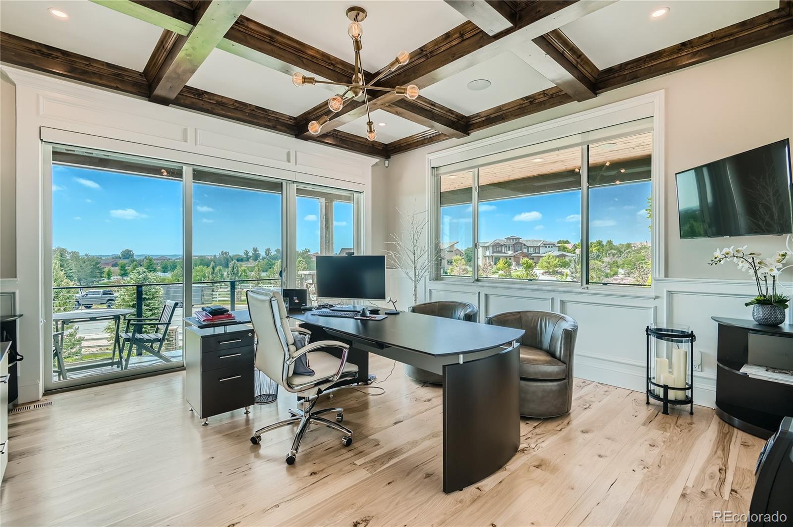 1757 Whistlepig Lane Broomfield, CO 80020 - Photo 28 of 50 a view of a workspace with furniture and a window