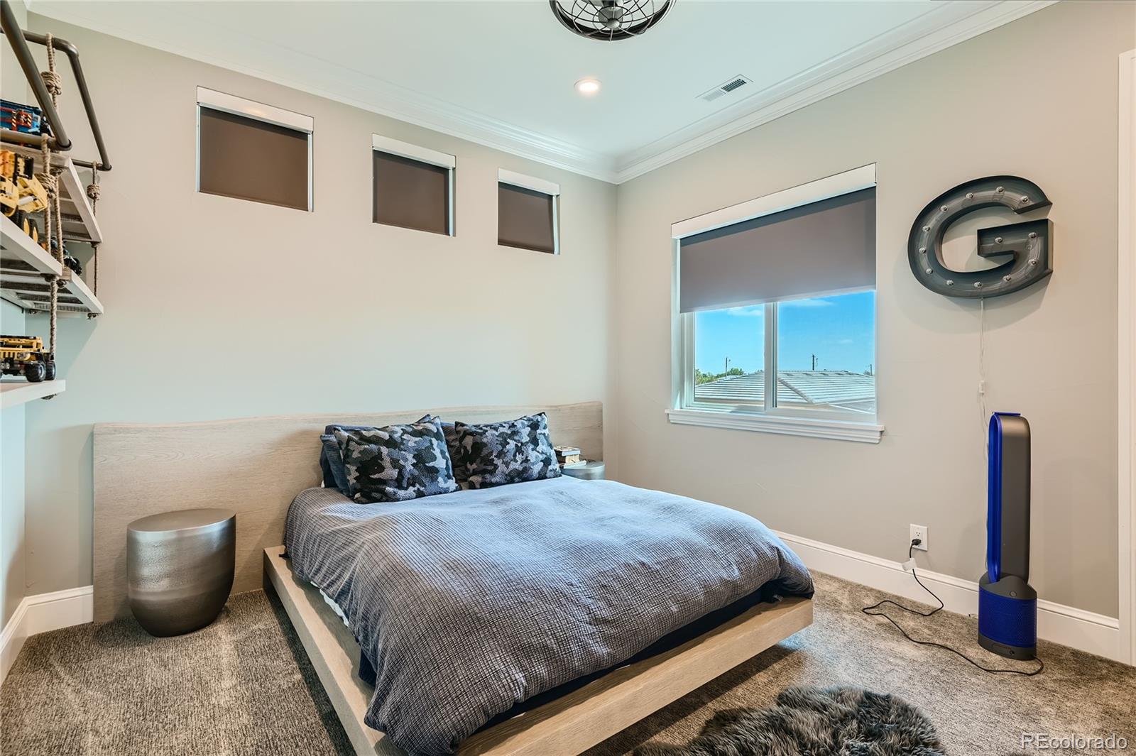 1757 Whistlepig Lane Broomfield, CO 80020 - Photo 35 of 50 a bedroom with a bed and a window