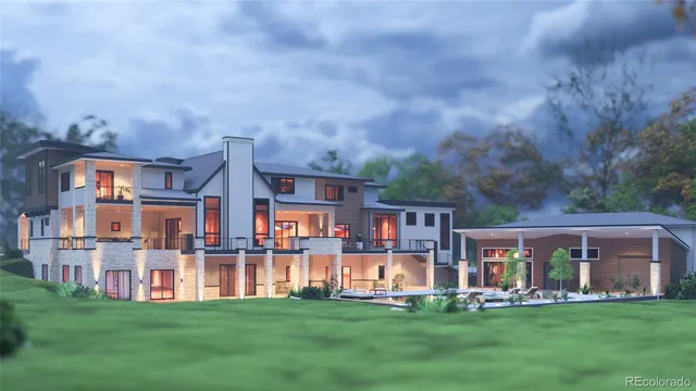 a front view of a house with a garden view