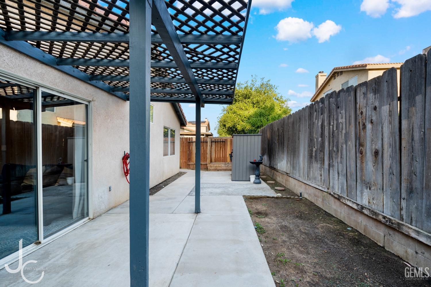 Undisclosed Address Bakersfield, CA 93311 - Photo 17 of 20 a view of a back yard of the house
