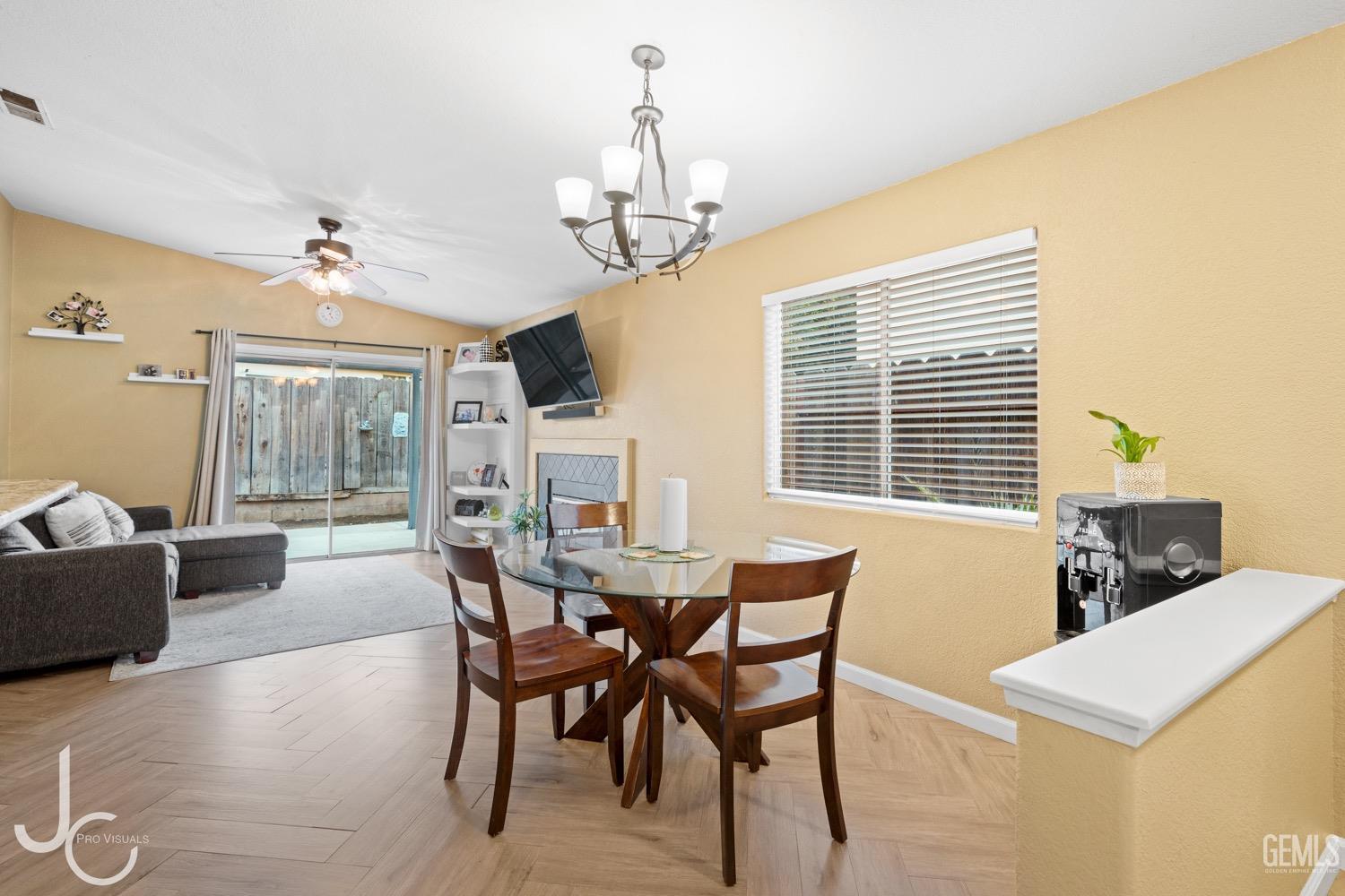 Undisclosed Address Bakersfield, CA 93311 - Photo 3 of 20 a view of a dining room with furniture window and outside view
