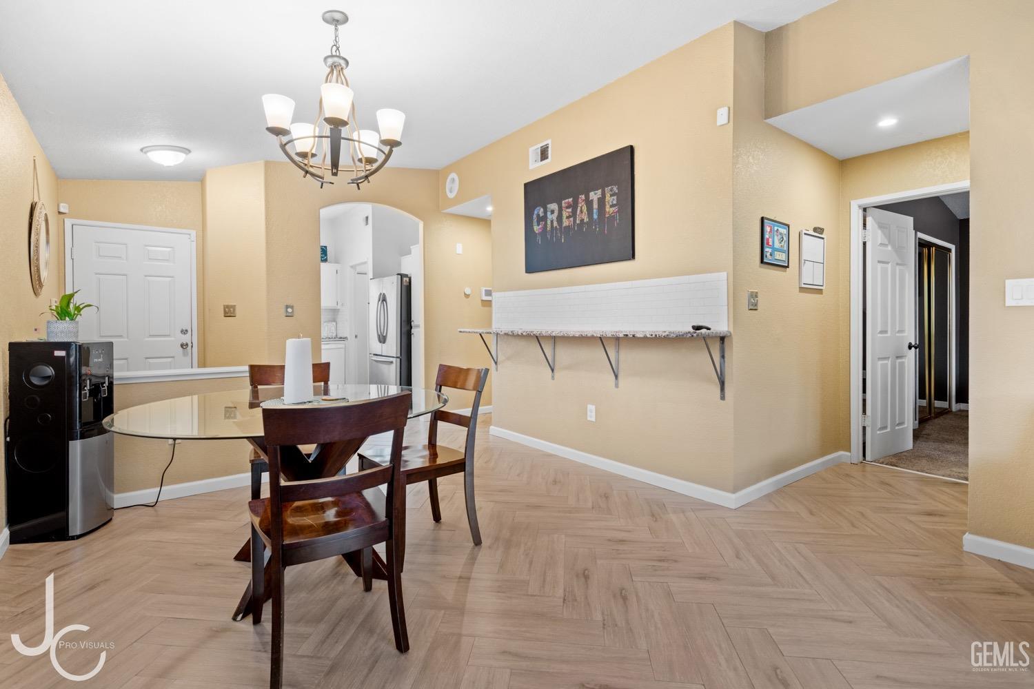 Undisclosed Address Bakersfield, CA 93311 - Photo 5 of 20 a view of a dining room with furniture